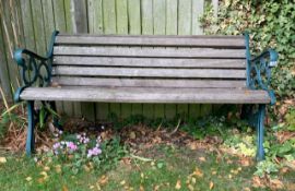A garden bench, hardwood slats, cast iron ends. Good condition 56 inch long. Collect Only.