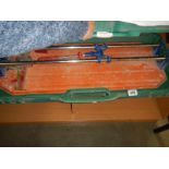 A large cased tile cutter.