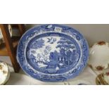 A blue and white Stoneware meat platter.