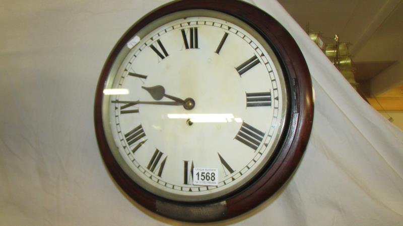 A circular chain driven wall clock. - Image 2 of 6