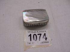 A James Furniss Ltd., Sheffield pewter snuff box with mother of pearl inset lid.