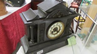 A black mantel clock, no key or pendulum, COLLECT ONLY.