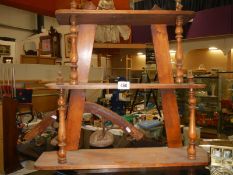 A Victorian wooden shelf unit.