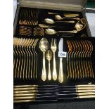 A Bestecke 'SBS' Solingen gold painted canteen of cutlery in leather case.