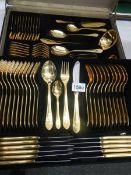 A Bestecke 'SBS' Solingen gold painted canteen of cutlery in leather case.