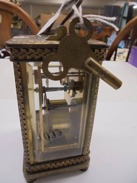 A brass carriage clock with key. - Image 4 of 4