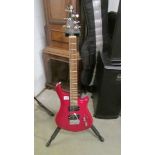 An 'AT' six string electric guitar with 'Hunbuckers', as new with case.