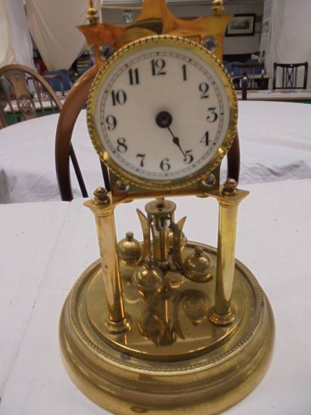 A 1905 400 day Torsion clock by Jaurensuren Fabric under glass dome. - Image 2 of 4