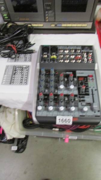 An as new Behringer QX1002 USB 12/10 input 2 bus mixing desk with instructions, COLLECT ONLY.