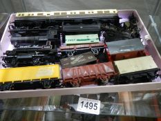 A quantity of unboxed '00' gauge rolling stock, coaches and locomotives.