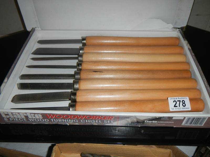 A box of wood turning chisels.