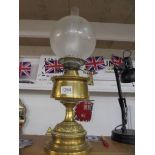 A brass oil lamp complete with chimney and acid etched shade, COLLECT ONLY.