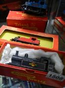 Three boxed Triang Hornby 00/H0 gauge engines including R.52 tank loco and R.355 Blue Nellie.