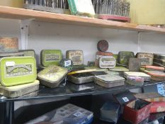 A collection of old tins with contents.