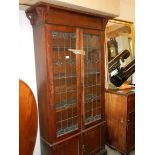 An art nouveau lead glazed oak book case. COLLECT ONLY.