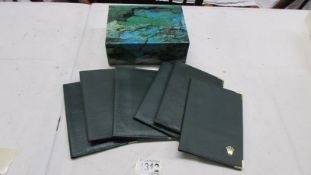 Six Rolex leather wallets (assumed genuine) and a Rolex box replacement.