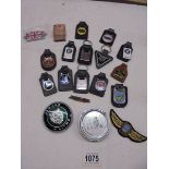 A quantity of key fobs, lighter, Jaguar badge, pilots wings, tin with coins etc.,