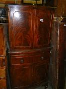 A bow front cabinet. COLLECT ONLY.