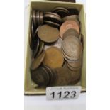 A large quantity of UK copper pennies.