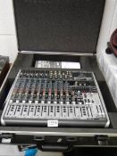 A Behringer QX 1832 USB wireless option mixer with instructions and flight case, as new.