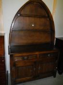 A 1950'S arch top open rack oak dresser. COLLECT ONLY.