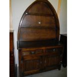 A 1950'S arch top open rack oak dresser. COLLECT ONLY.