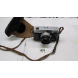 A vintage Canon Canonet camera, serial No. 1069259.