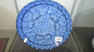 A 28 cm diameter blue patterned Chinese plate.