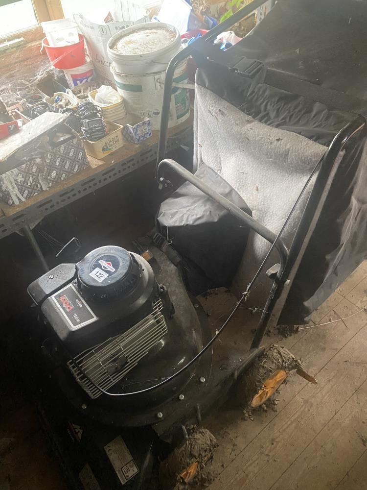 A Briggs and Stratton engined lawn vacuum. Collect Only.