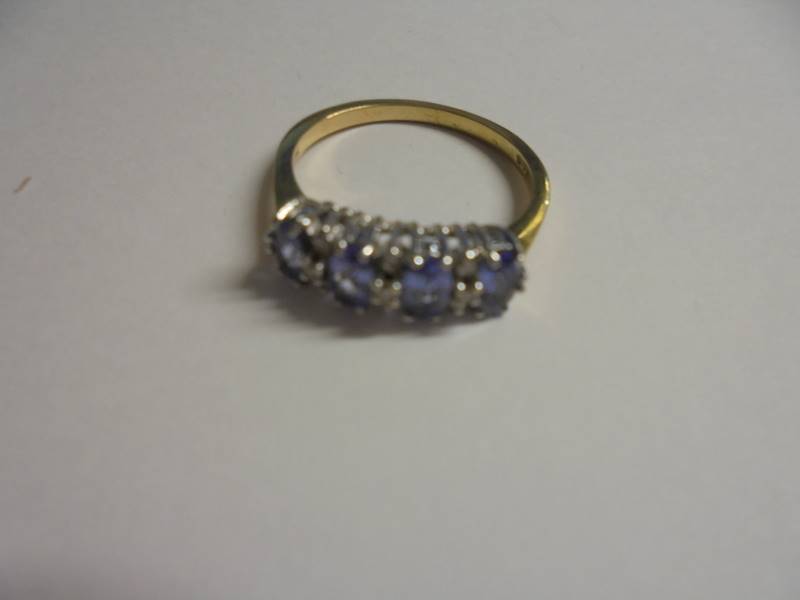 A tanzanite and diamond ring stamped 18ct gold, size P half. - Image 2 of 2