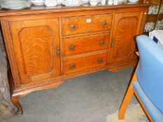 An oak sideboard on Queen Anne legs, COLLECT ONLY.