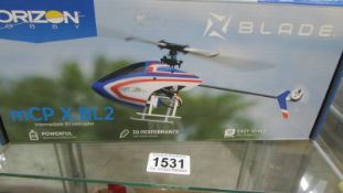 A Blade MLPX BLZ helicopter, needs your own transmitter.