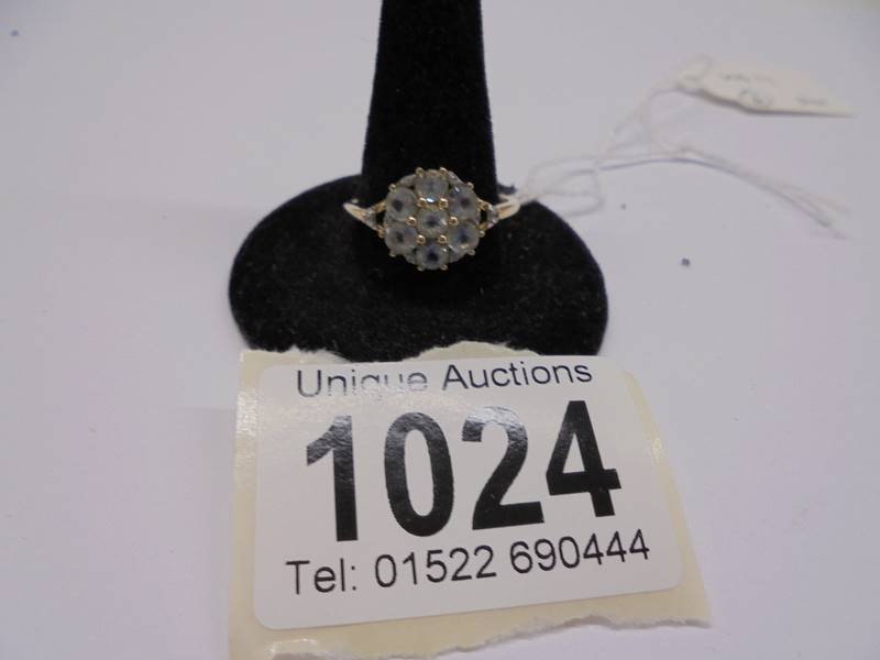 An aquamarine and diamond ring marked 925, size R half, 2.1 grams.