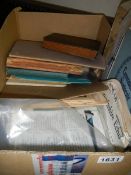 A box of ephemera including old adverts, Rupert books & coins etc.