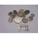 Twenty five USA silver coins approximately 101 grams.