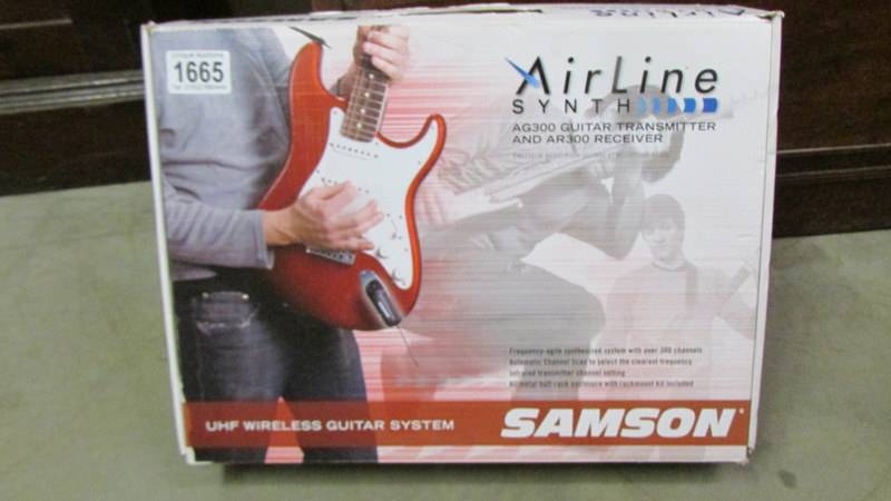 A Samson 'Airline' AG-300 wireless guitar system.