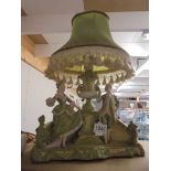 An early 20th century bisque figural table lamp, a/f.