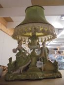 An early 20th century bisque figural table lamp, a/f.