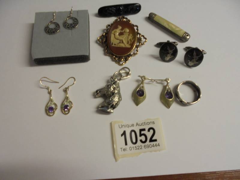 A cameo brooch, pen knife, horse head pendant, silver cuff links, Victorian black brooch, three