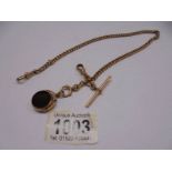 A 9ct gold Watch Albert with onyx fob, total weight 35 grams.