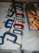 A quantity of clamps.