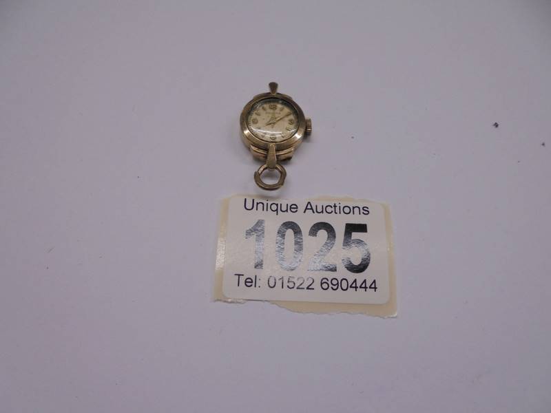 A 9ct gold lady's watch head, in working order.