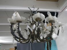 A brass and glass ten light chandelier, COLLECT ONLY.