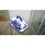 A blue and white Ironstone cheese dish.