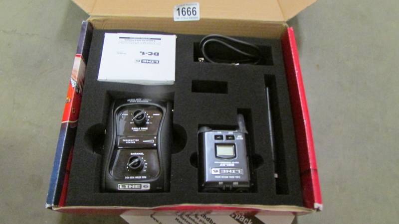 A boxed relay G50 digital wireless guitar system with instructions. - Image 2 of 2