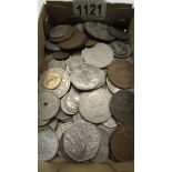 A mixed lot of UK and foreign coins.