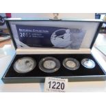 A cased Britannia collection 2005 silver proof four coin set with certificate.