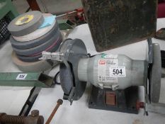 A bench grinder a/f and grinding wheels.