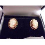 A pair of 9ct gold cameo set stud earrings.