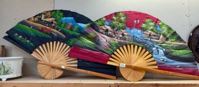 2 Large hand painted oriental wall fans. 101cm x 61cm.
